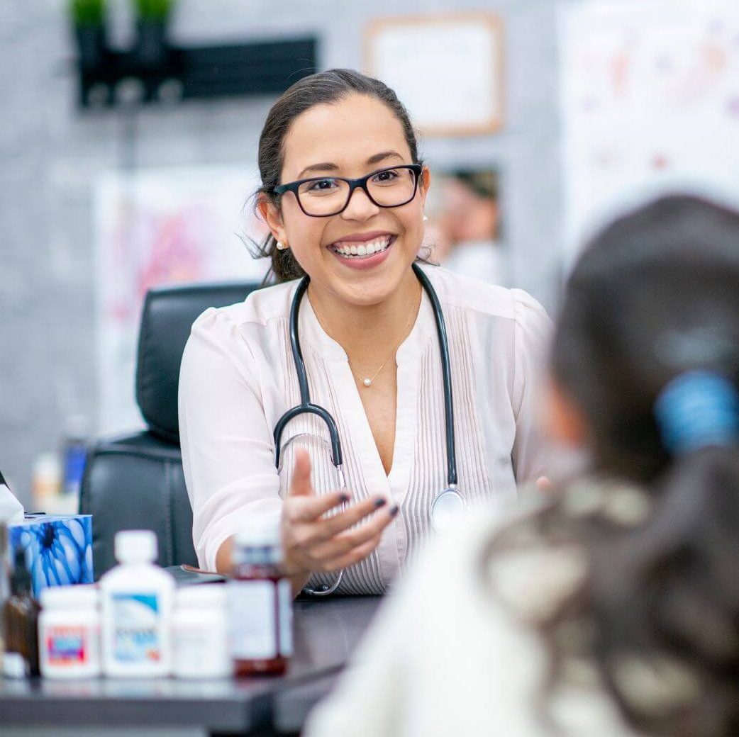 medical provider communicating with patient