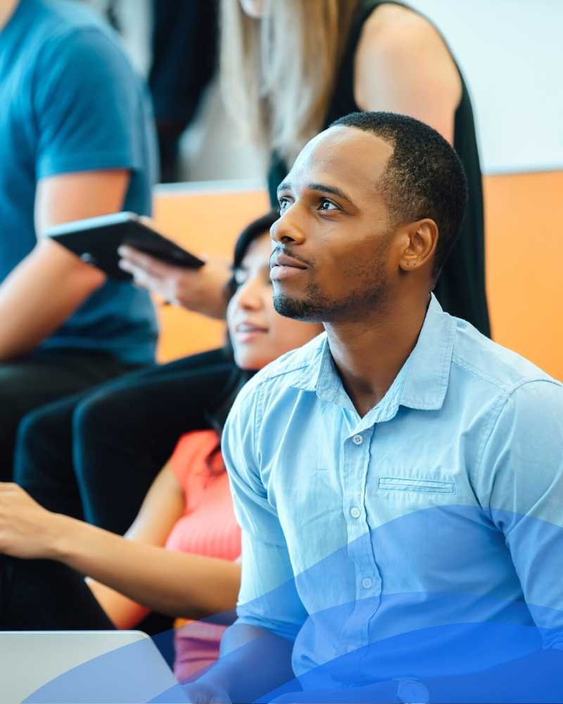 man learning blue shirt tall