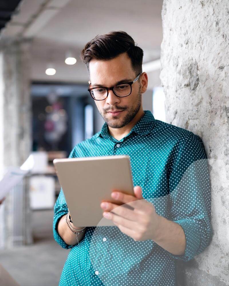 A man works with a tablet