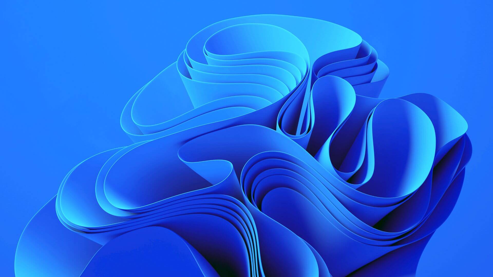 abstract blue shape with flowing organic layered folds