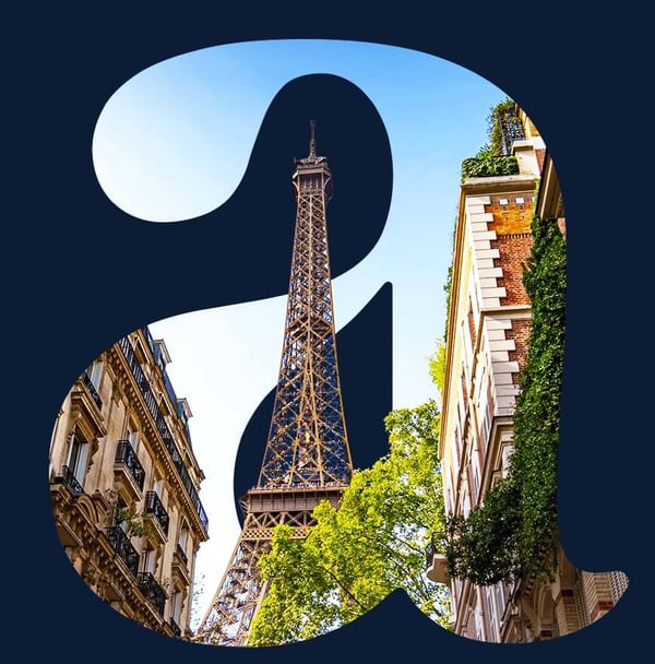 Acolad "a" logo with Eiffel Tower in the center