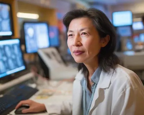 doctor looking at screens