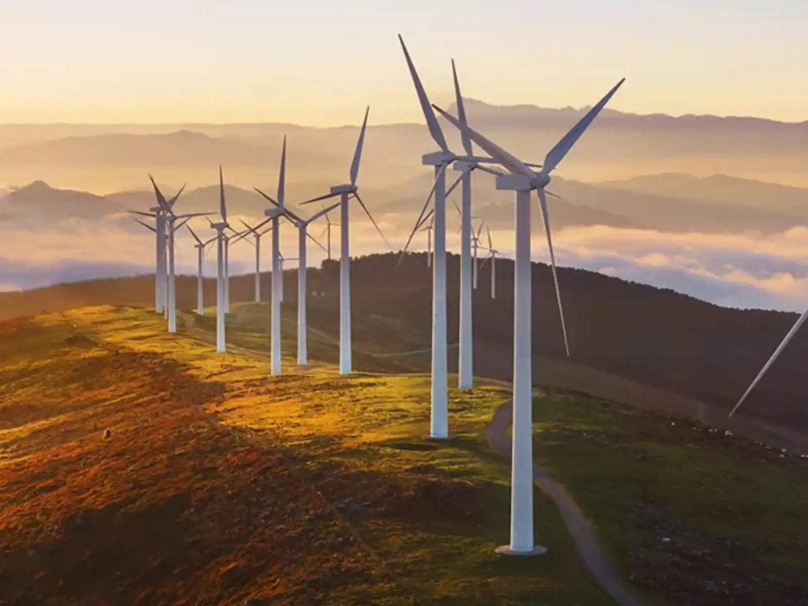 wind turbines generating energy on hilltop