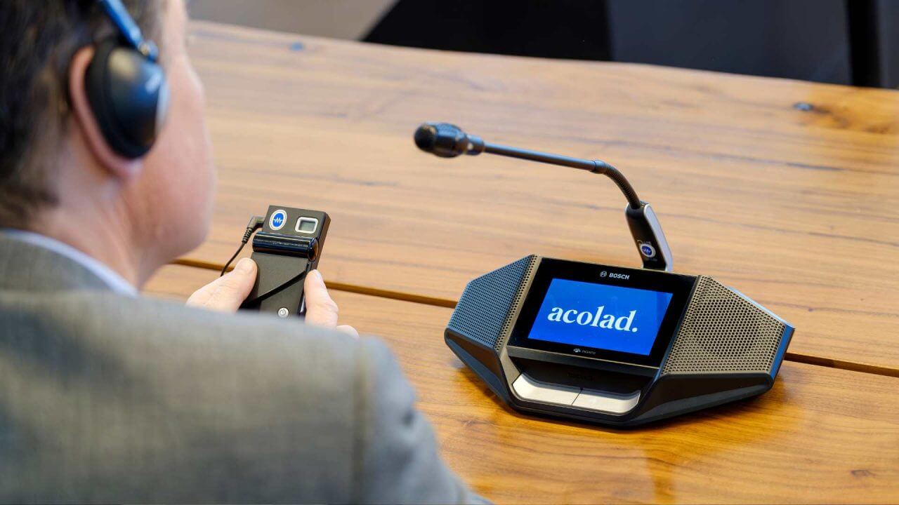 man using Acolad interpreting tools