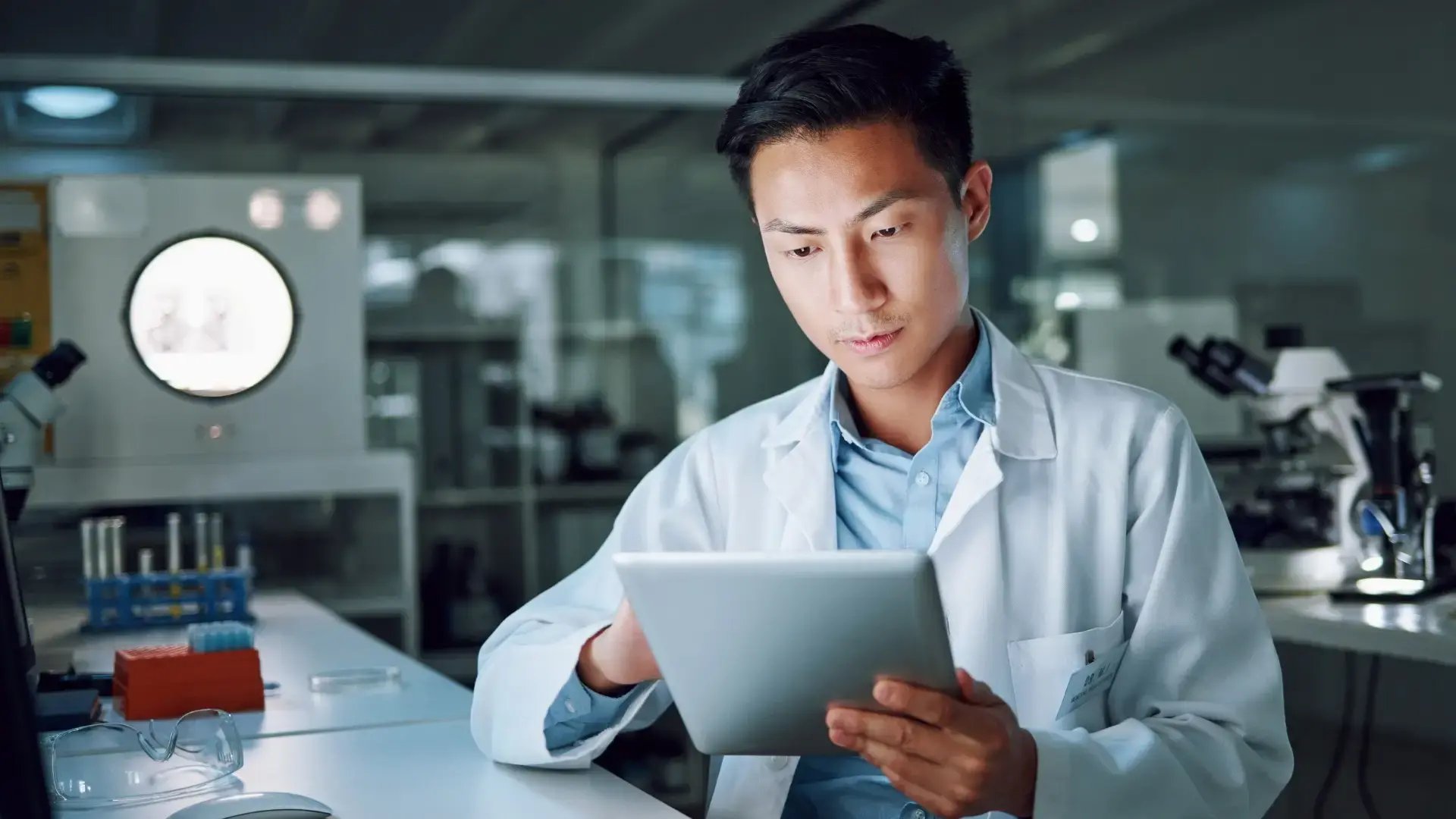 doctor on tablet during clinical research study