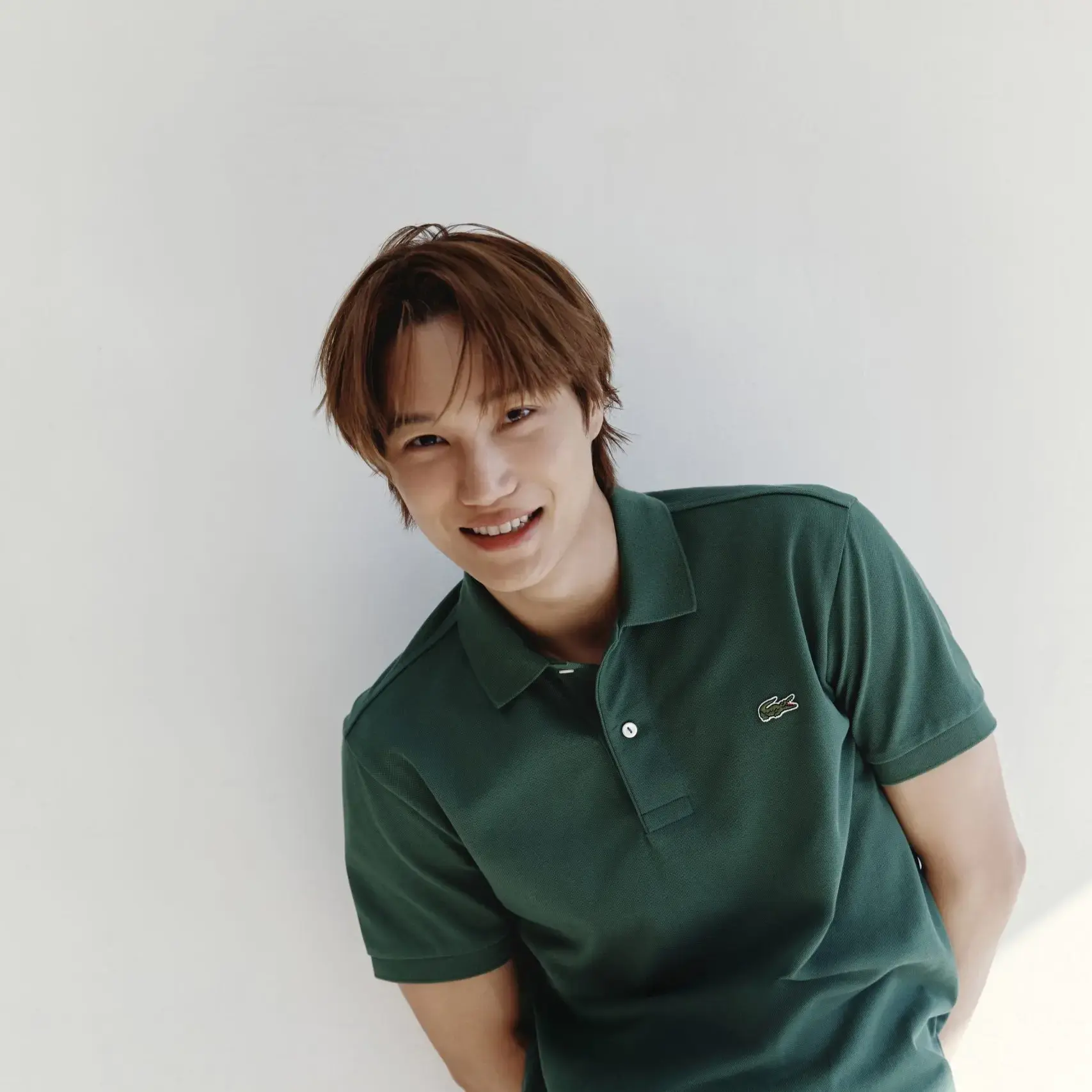 KAI of EXO wearing Lacoste polo shirt