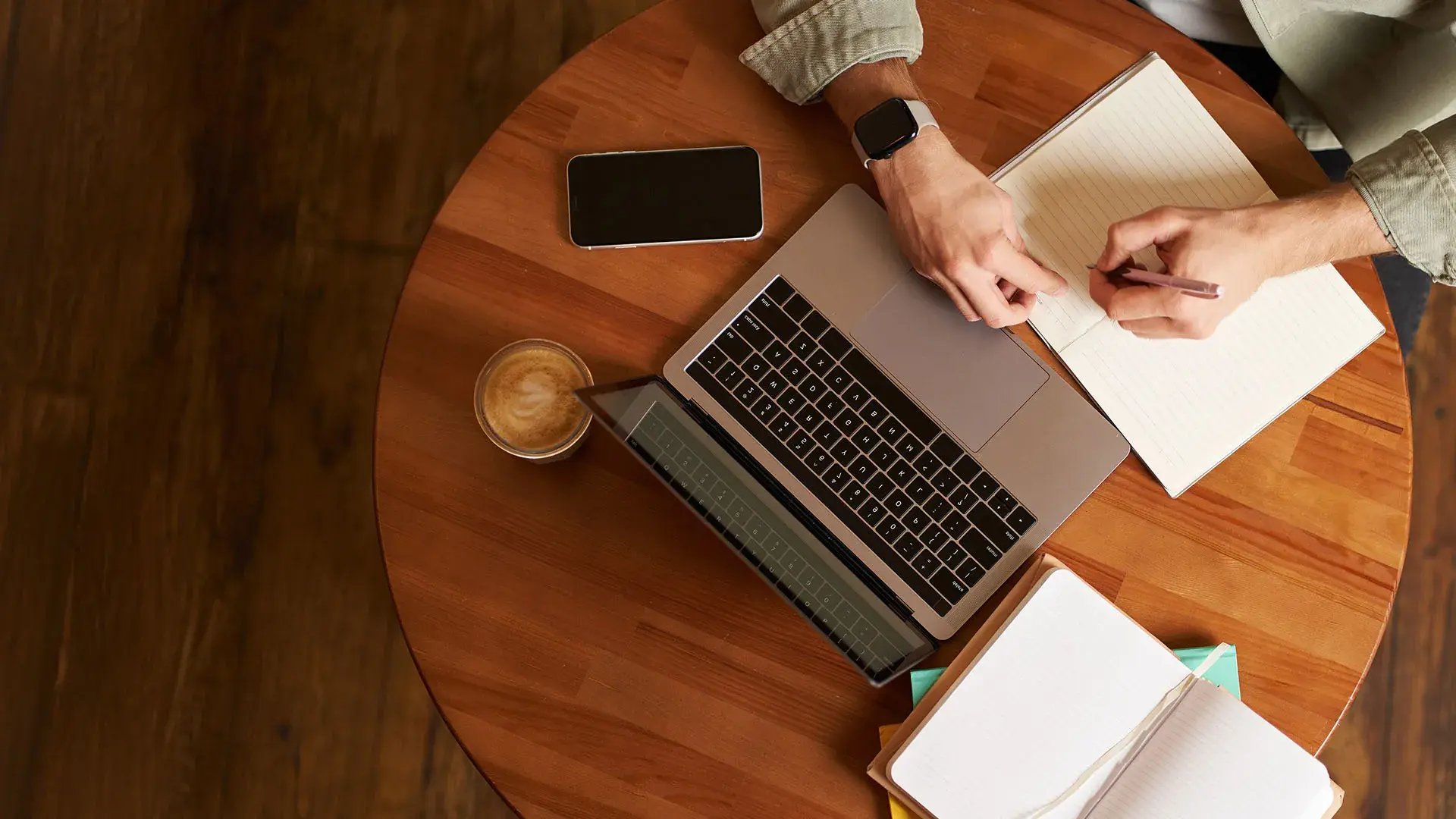 top-aerial-view-male-hands-taking-notes