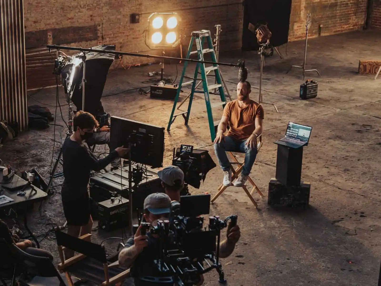 video production set with cameras and studio lighting