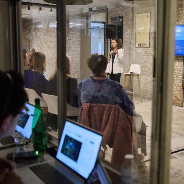 view from inside an interpreting booth at an Acolad event